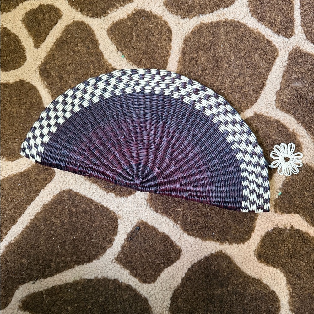 Elegant Black and White Woven Clutch